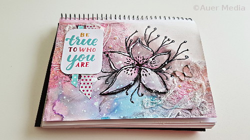 Mixed media Art journal page with a lily drawing