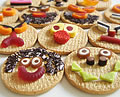 Party idea 5: Funny faces biscuits for boys´party: pirates, space monsters, happy faces, mad faces...
